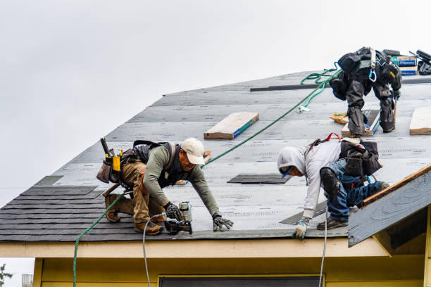 Professional Gutter Installation technician working in Oakhurst, CA